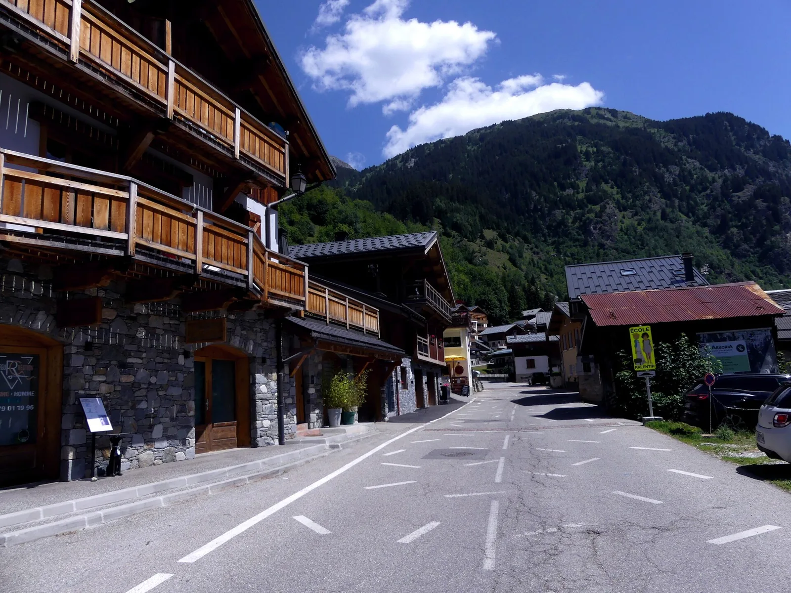 Rue de la Vanoise street through Champagny-en-Vanoise village in summer
